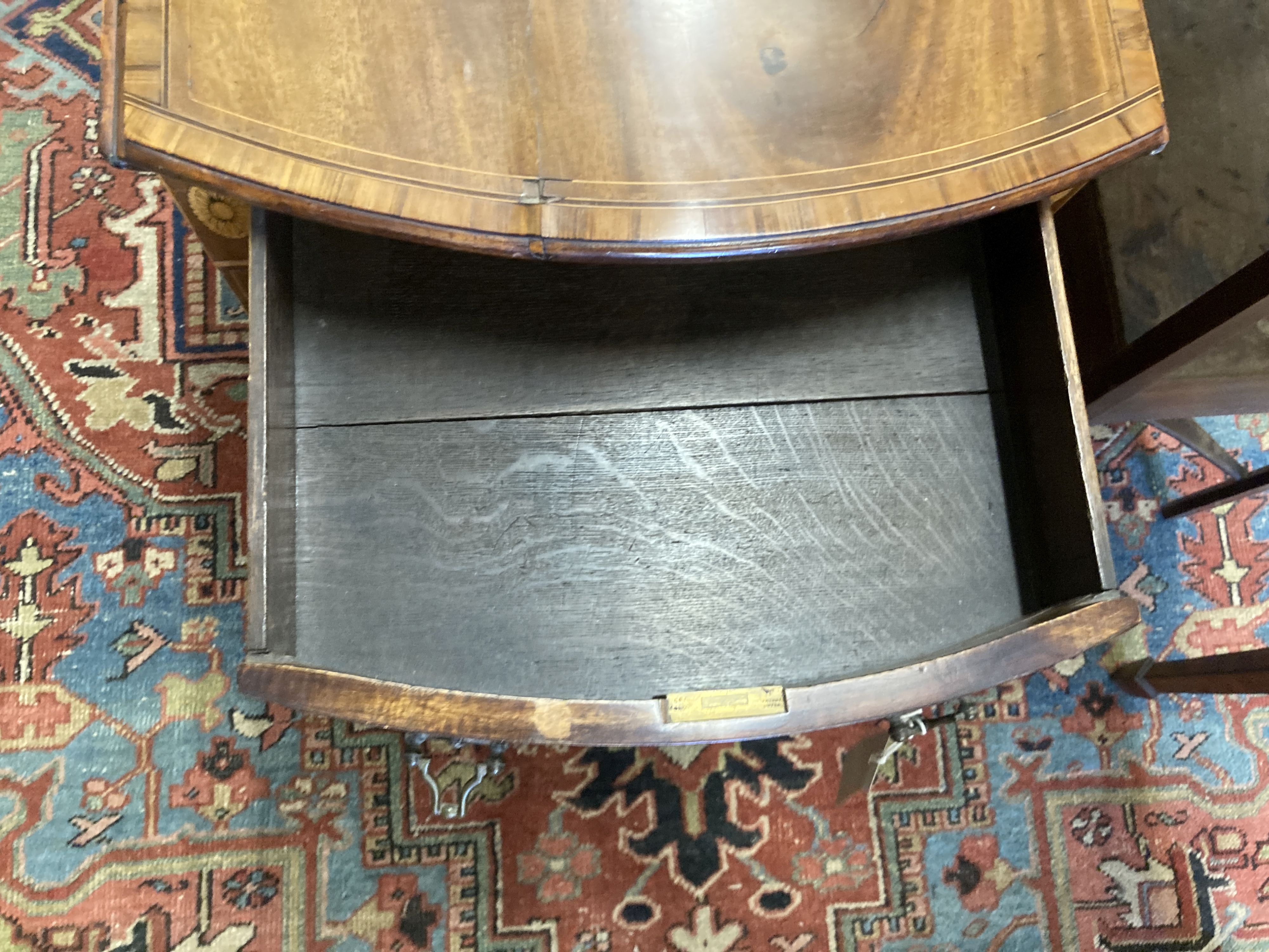 A George III rosewood banded and inlaid mahogany oval Pembroke table, width 79cm depth 49cm, height 68cm